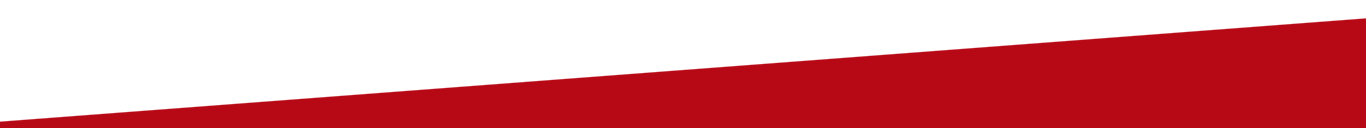 A close up of a red and white background with a white border.