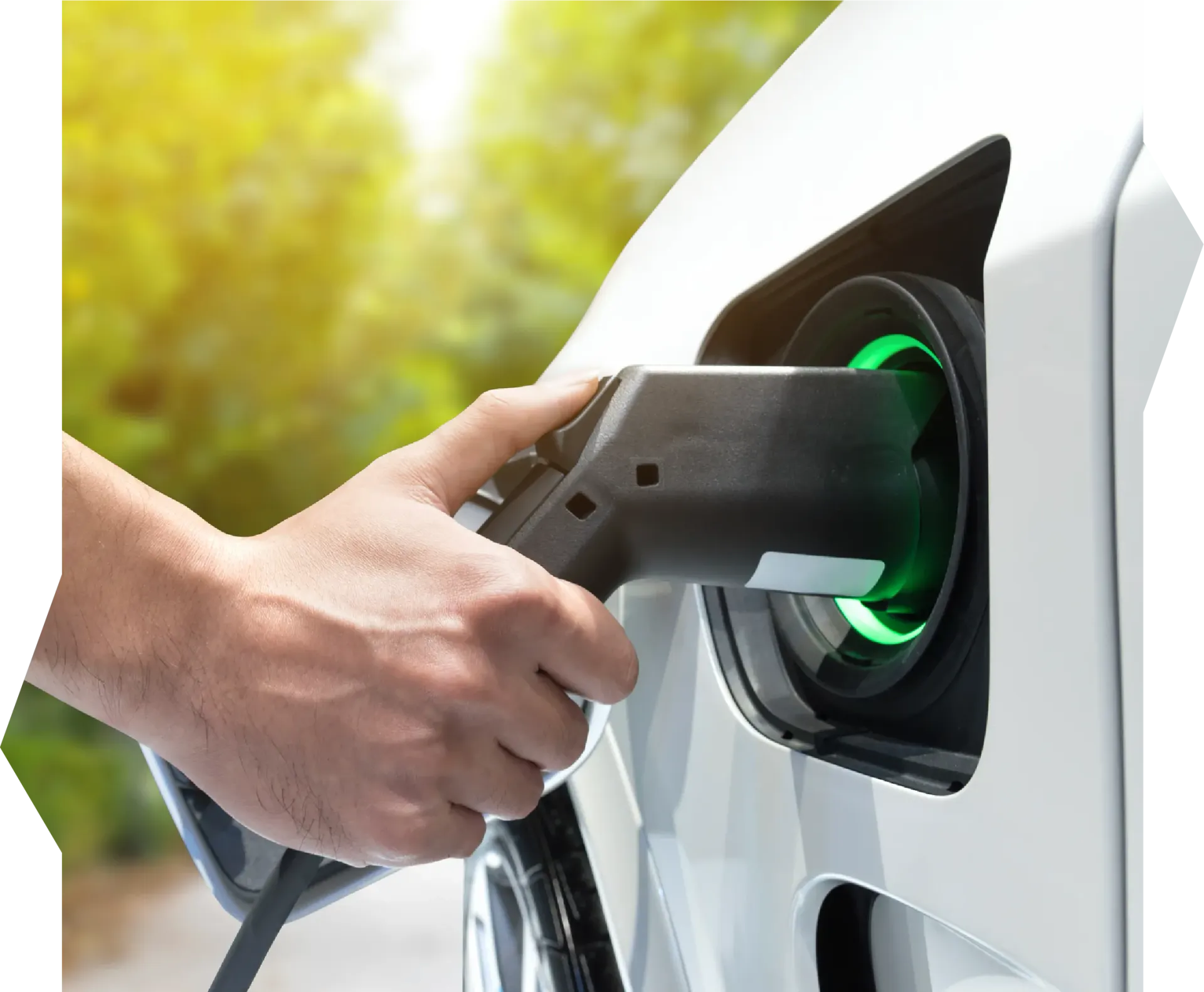 A person is opening a car door with a key.