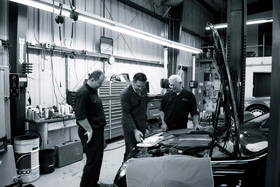 BMW Repairs — Staff Checking Car Engine in Napa, CA