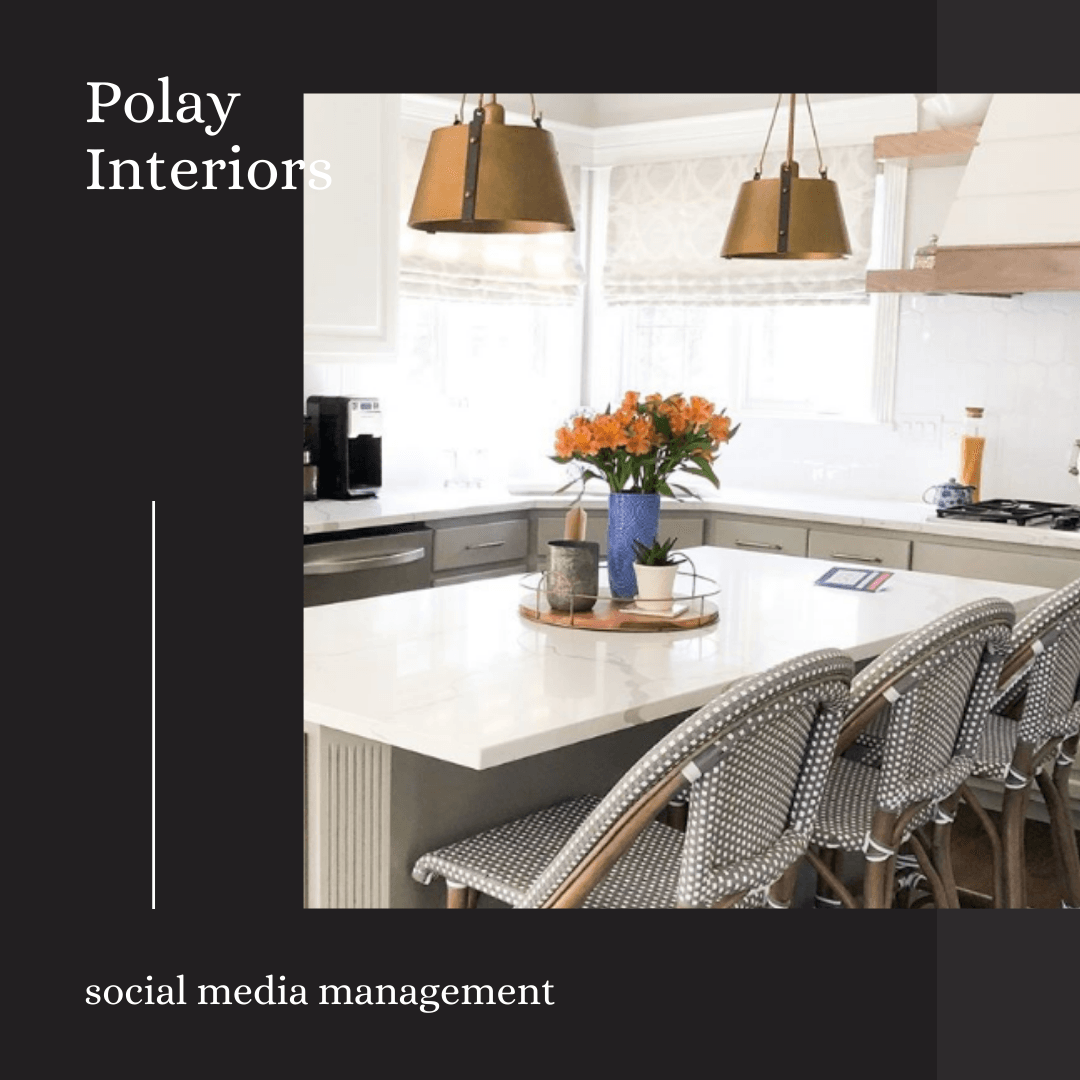 A kitchen with a large island and wicker chairs.