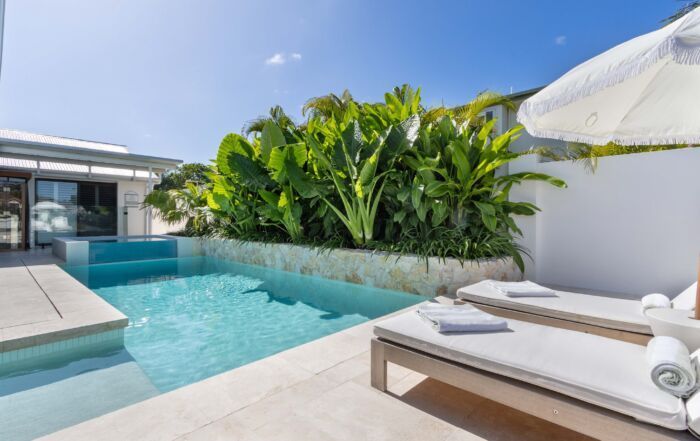 Modern Villa Pool with Turquoise Water — Mad Pool Interiors and Renovations in Baringa, QLD