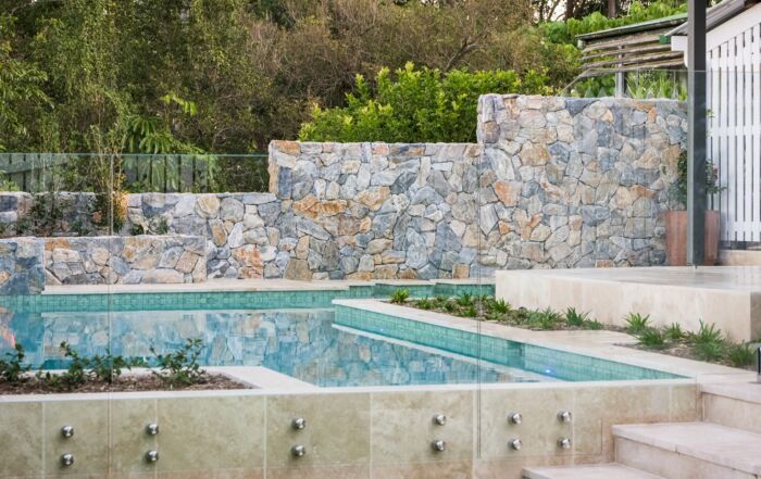 Backyard Pool with Turquoise Water — Mad Pool Interiors and Renovations in Baringa, QLD