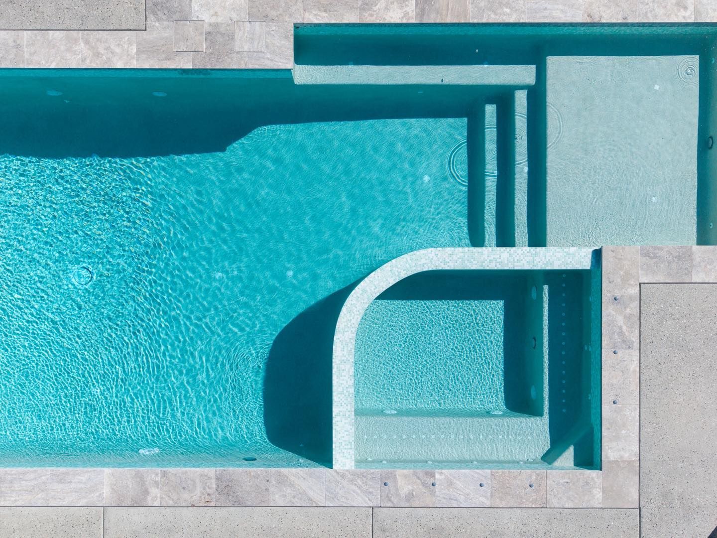 Top-down View of a Turquoise Swimming Pool — Mad Pool Interiors and Renovations in Baringa, QLD