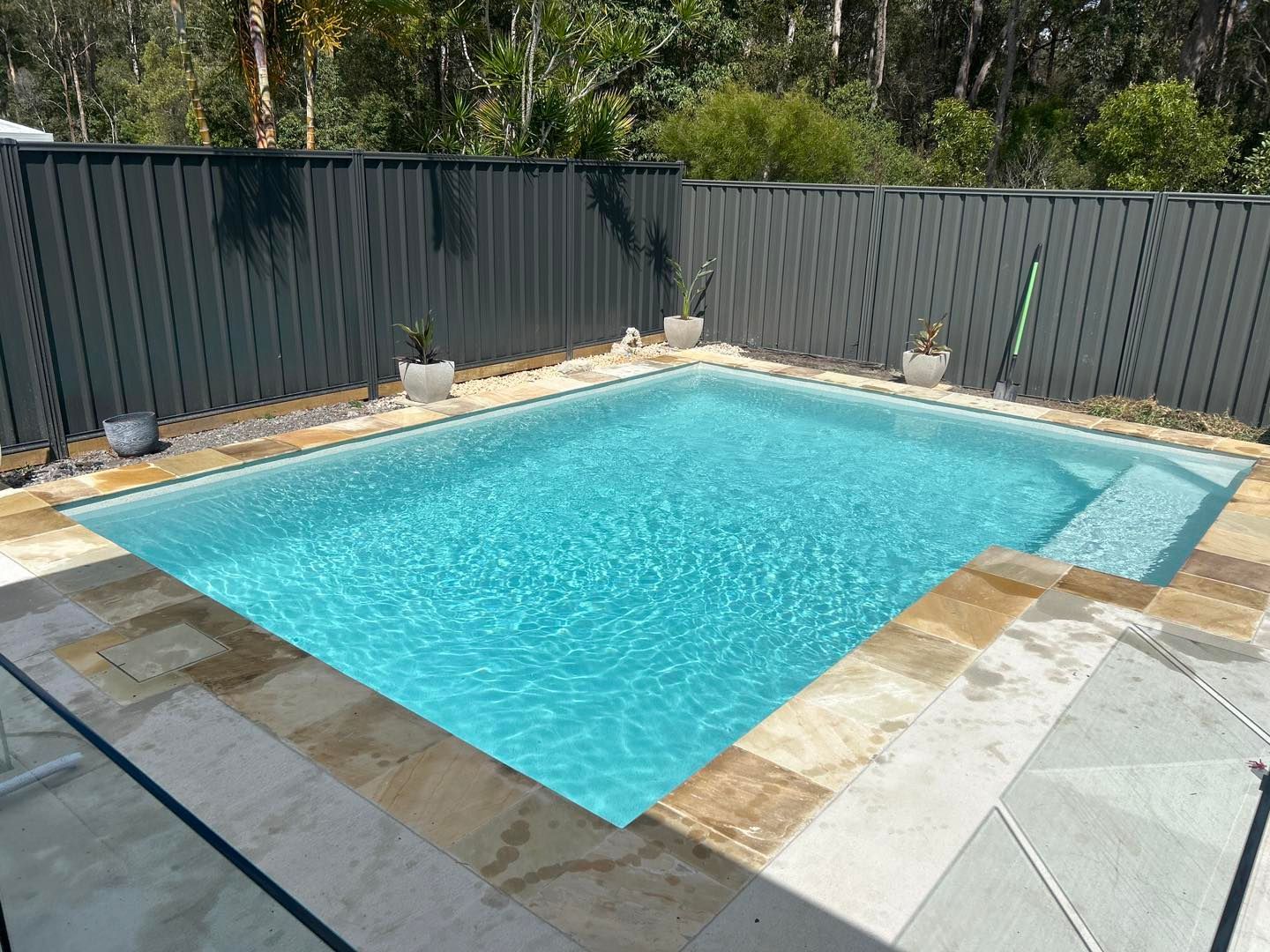 Small Rectangular Pool With Blue Water — Mad Pool Interiors and Renovations in Baringa, QLD