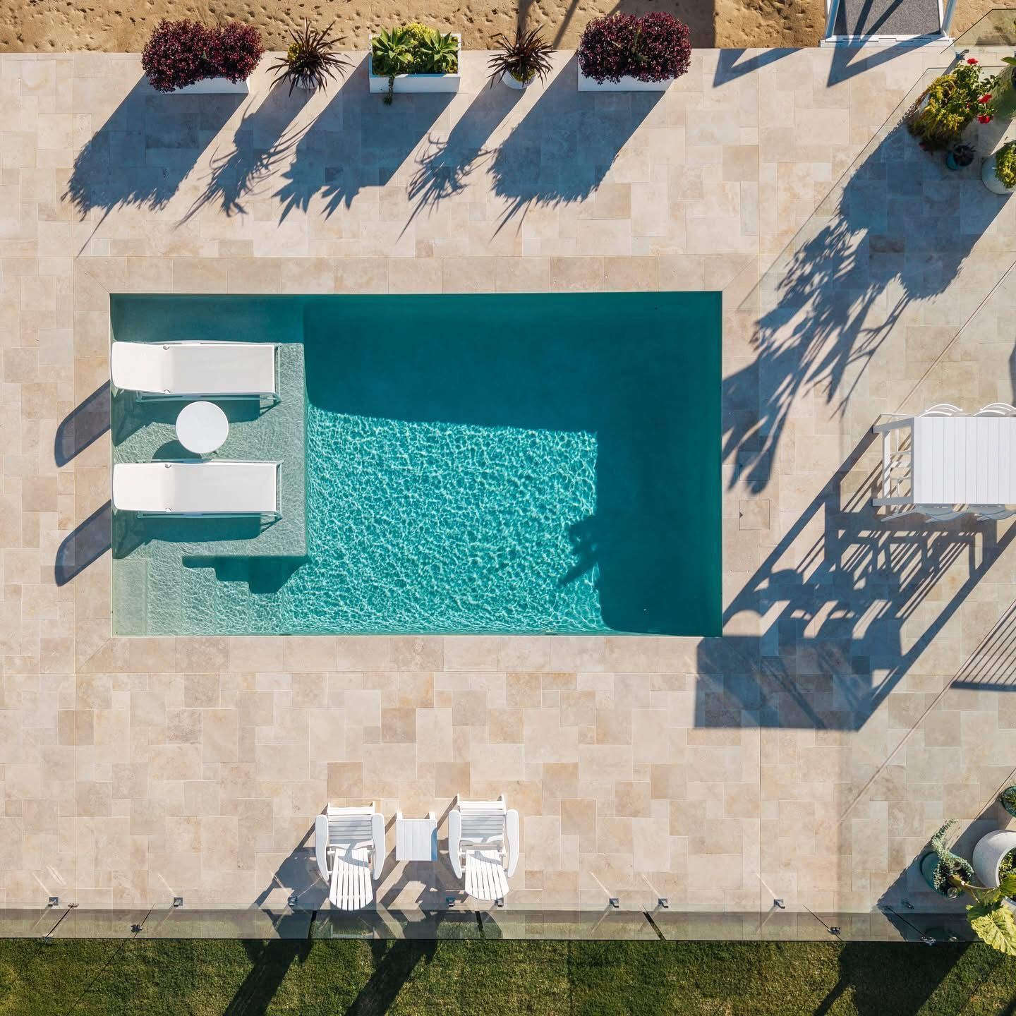Overhead View of a Turquoise Swimming Pool — Mad Pool Interiors and Renovations in Baringa, QLD
