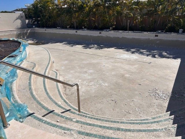 Empty Concrete Pool Under Construction With Steps — Mad Pool Interiors and Renovations in Baringa, QLD