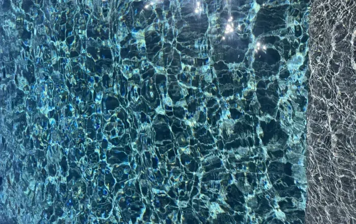 Blue Water Surface with Sunlight Reflecting in Rippling Patterns — Mad Pool Interiors and Renovations in Baringa, QLD