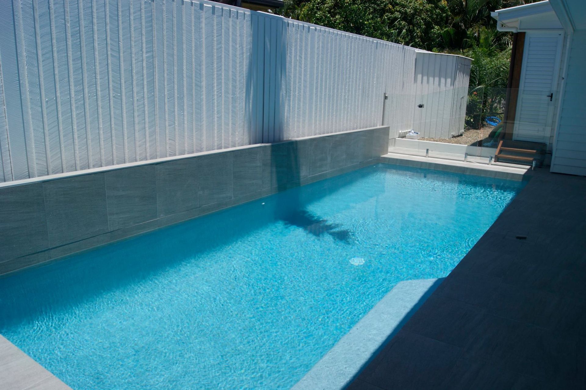 Rectangular Outdoor Pool With Light Blue Water — Mad Pool Interiors and Renovations in Baringa, QLD