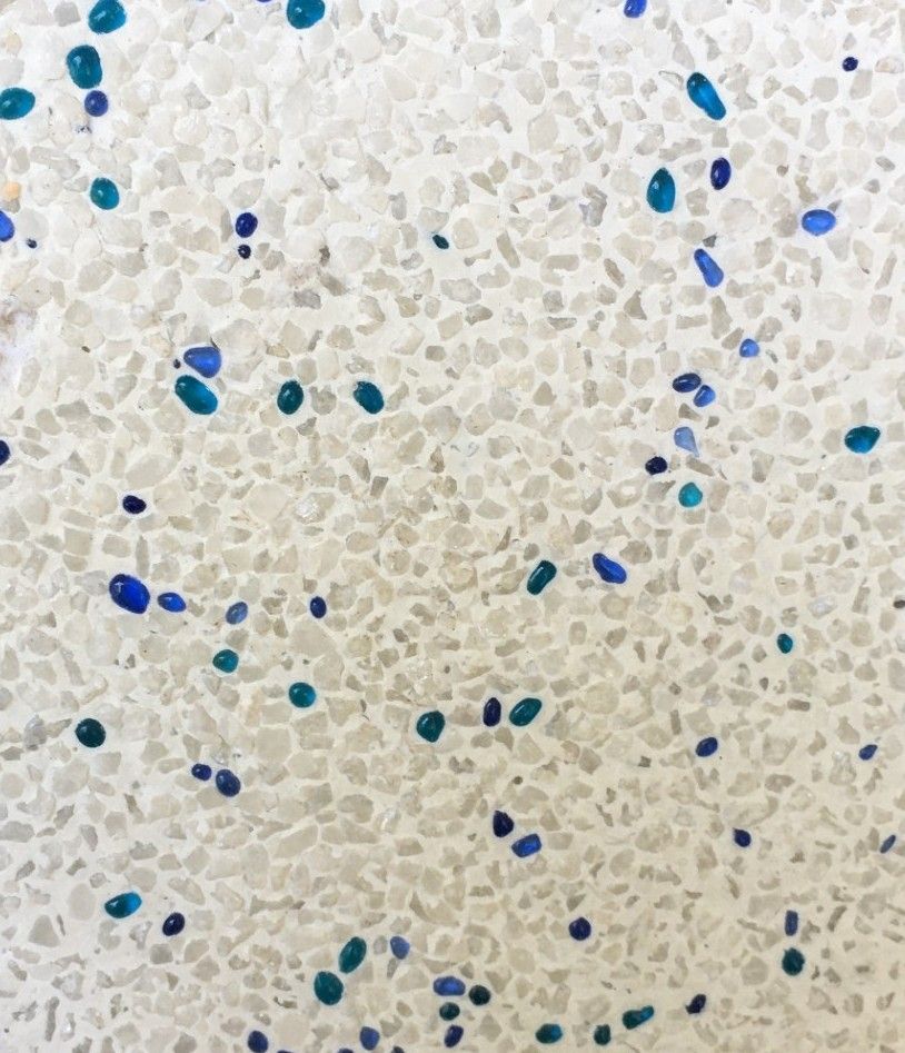 White Speckled Surface With Scattered Blue and Teal Stones — Mad Pool Interiors and Renovations in Baringa, QLD