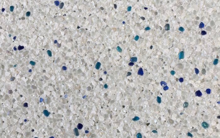 Light Gray Speckled Surface with Scattered Blue and Teal Flecks — Mad Pool Interiors and Renovations in Baringa, QLD