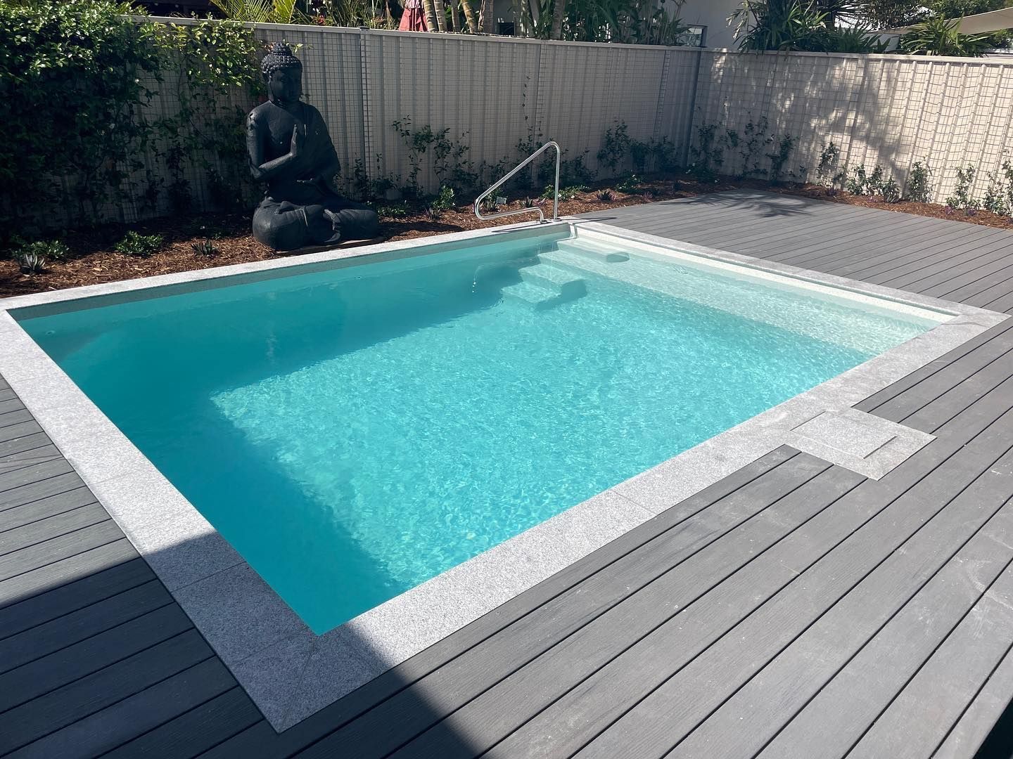 Small Rectangular Pool With Blue Water and Steps — Mad Pool Interiors and Renovations in Baringa, QLD