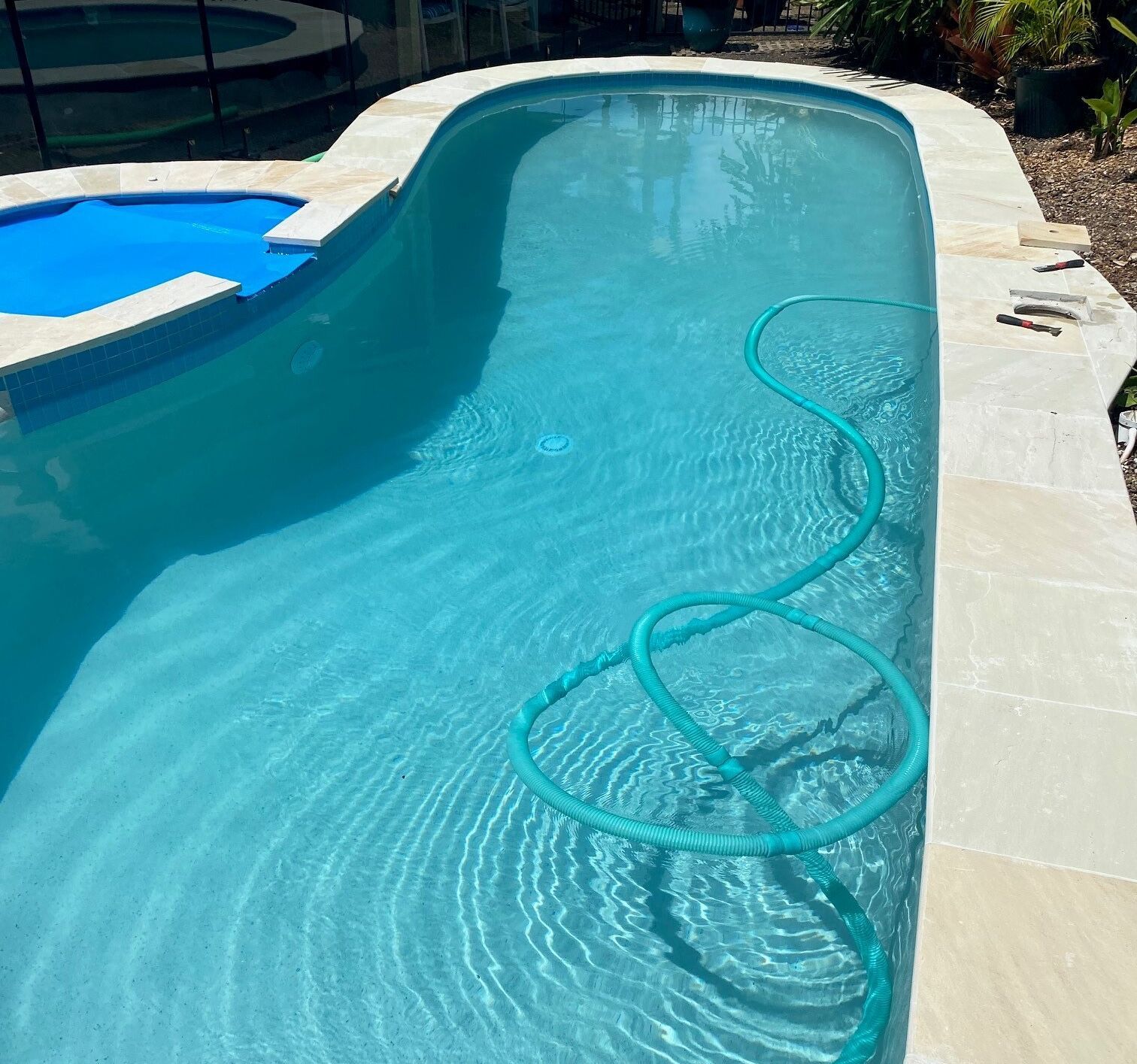 Backyard Swimming Pool — Mad Pool Interiors and Renovations in Baringa, QLD