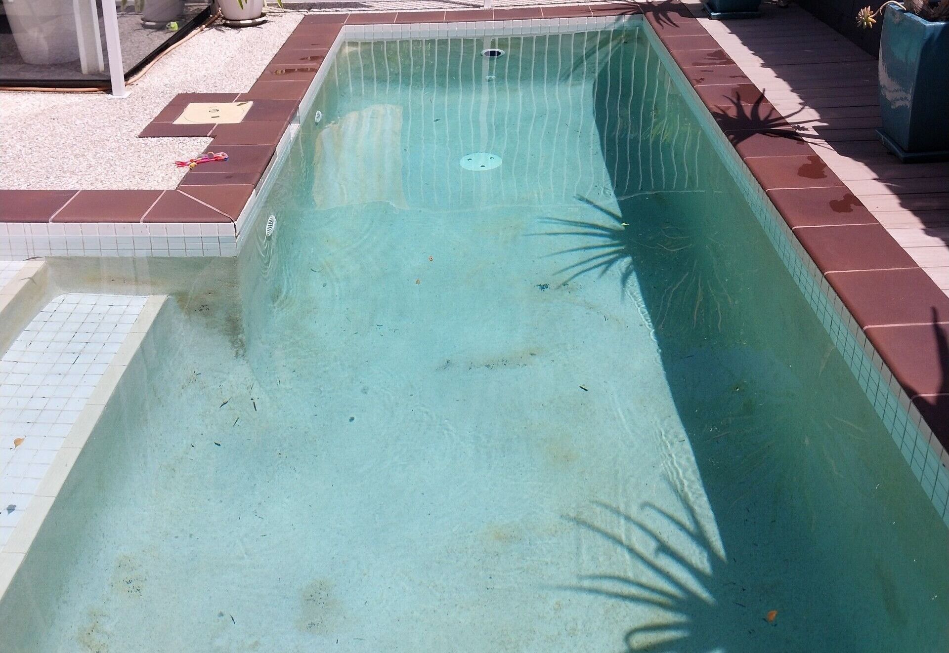 Narrow Turquoise Swimming Pool — Mad Pool Interiors and Renovations in Baringa, QLD