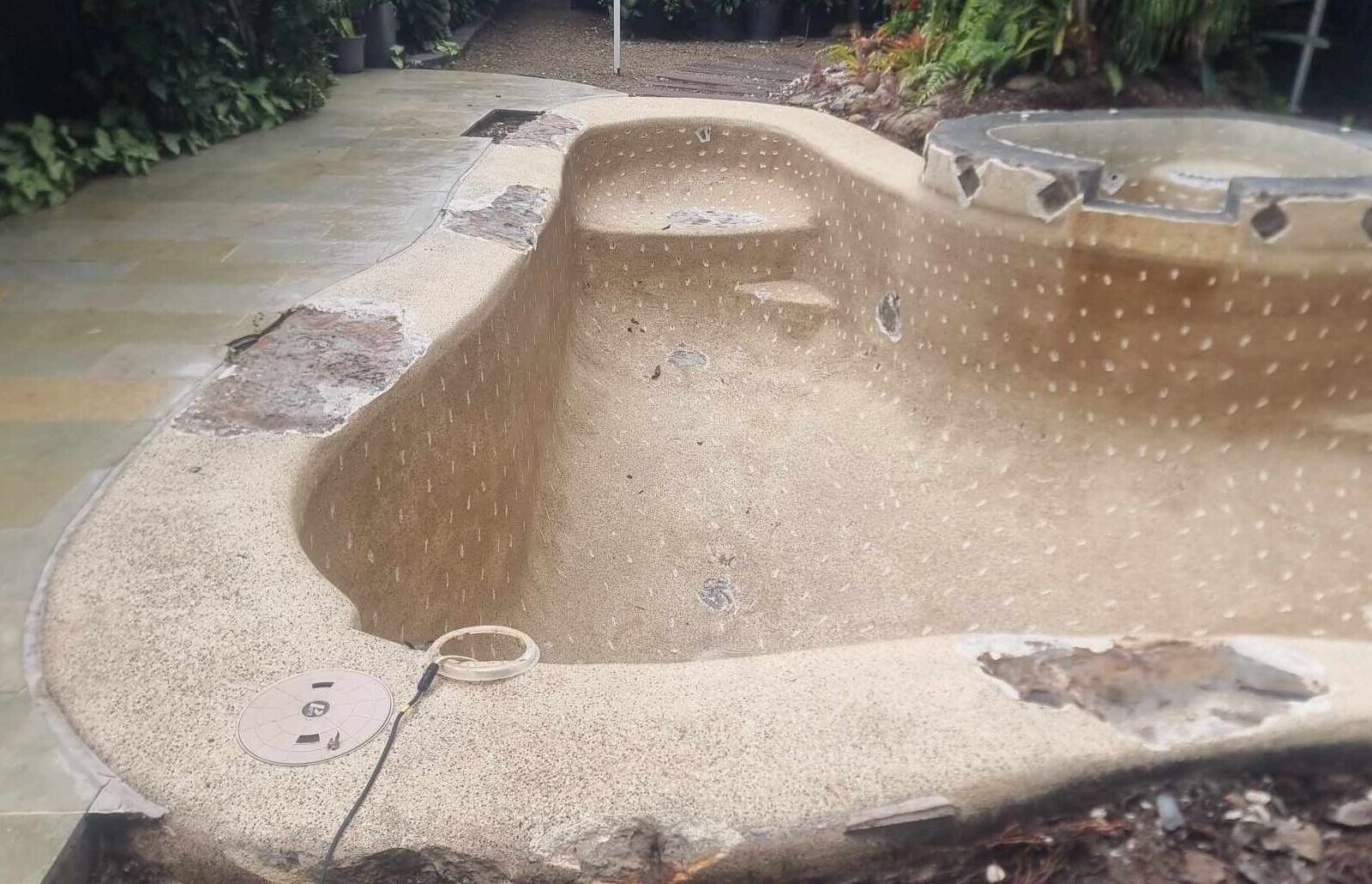Empty Drained Swimming Pool — Mad Pool Interiors and Renovations in Baringa, QLD