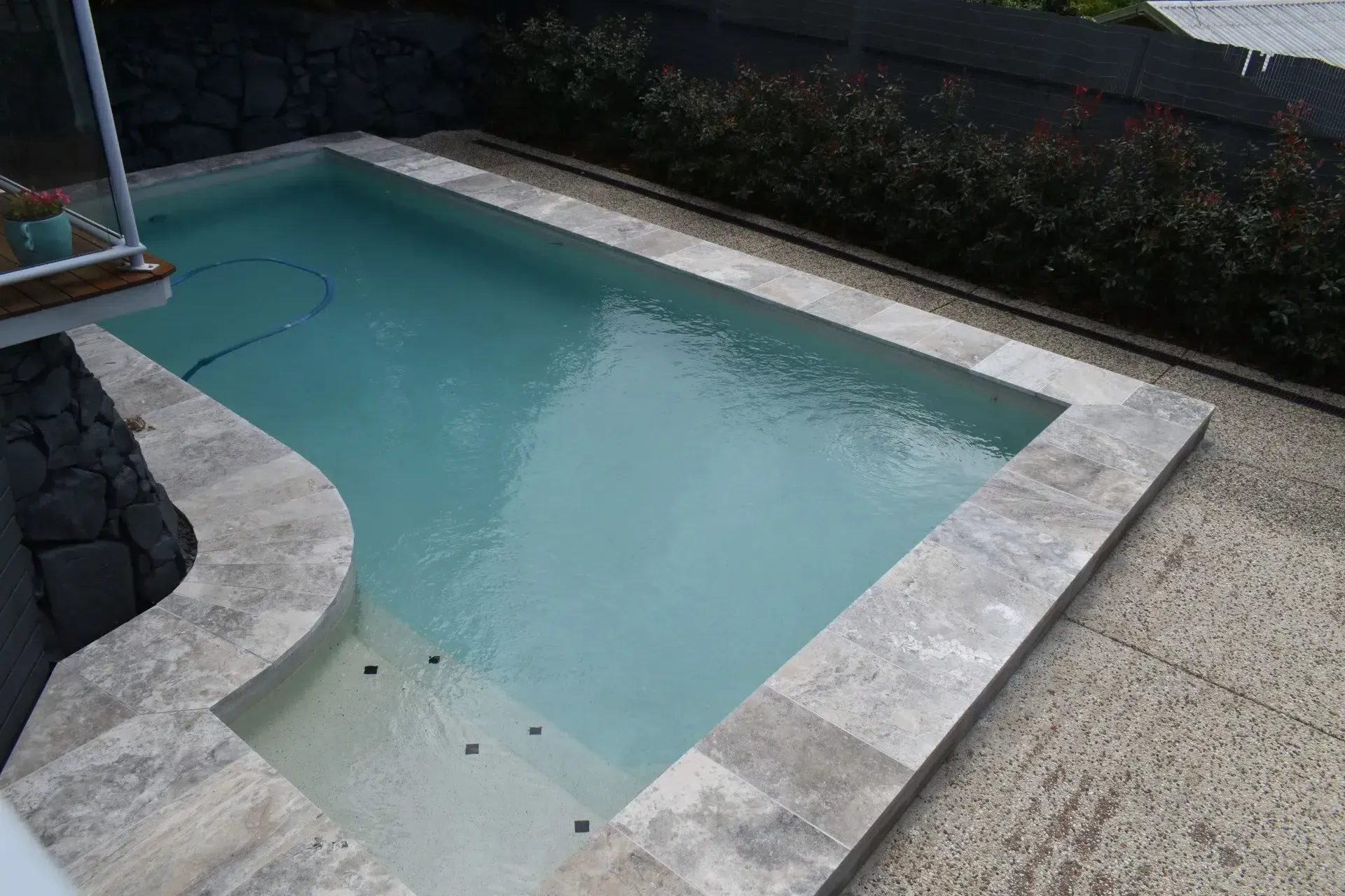 Small Rectangular Backyard Pool — Mad Pool Interiors and Renovations in Baringa, QLD