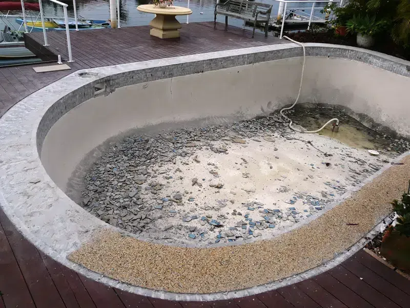 Empty Drained Swimming Pool — Mad Pool Interiors and Renovations in Baringa, QLD