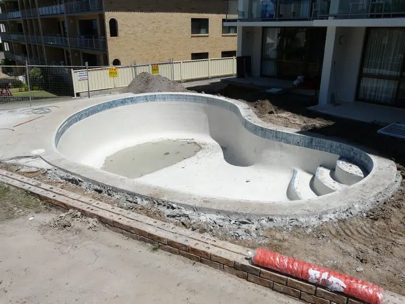Empty Concrete Pool Under Construction — Mad Pool Interiors and Renovations in Baringa, QLD