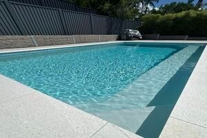 Rectangular Outdoor Swimming Pool with Clear Blue Water — Mad Pool Interiors and Renovations in Baringa, QLD