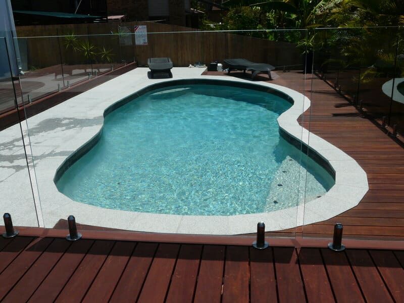 Pool With Light Blue Water Surrounded by a White Border — Mad Pool Interiors and Renovations in Baringa, QLD