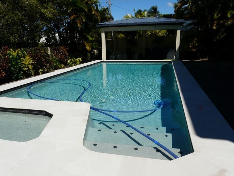 A Rectangular Swimming Pool With Steps — Mad Pool Interiors and Renovations in Baringa, QLD