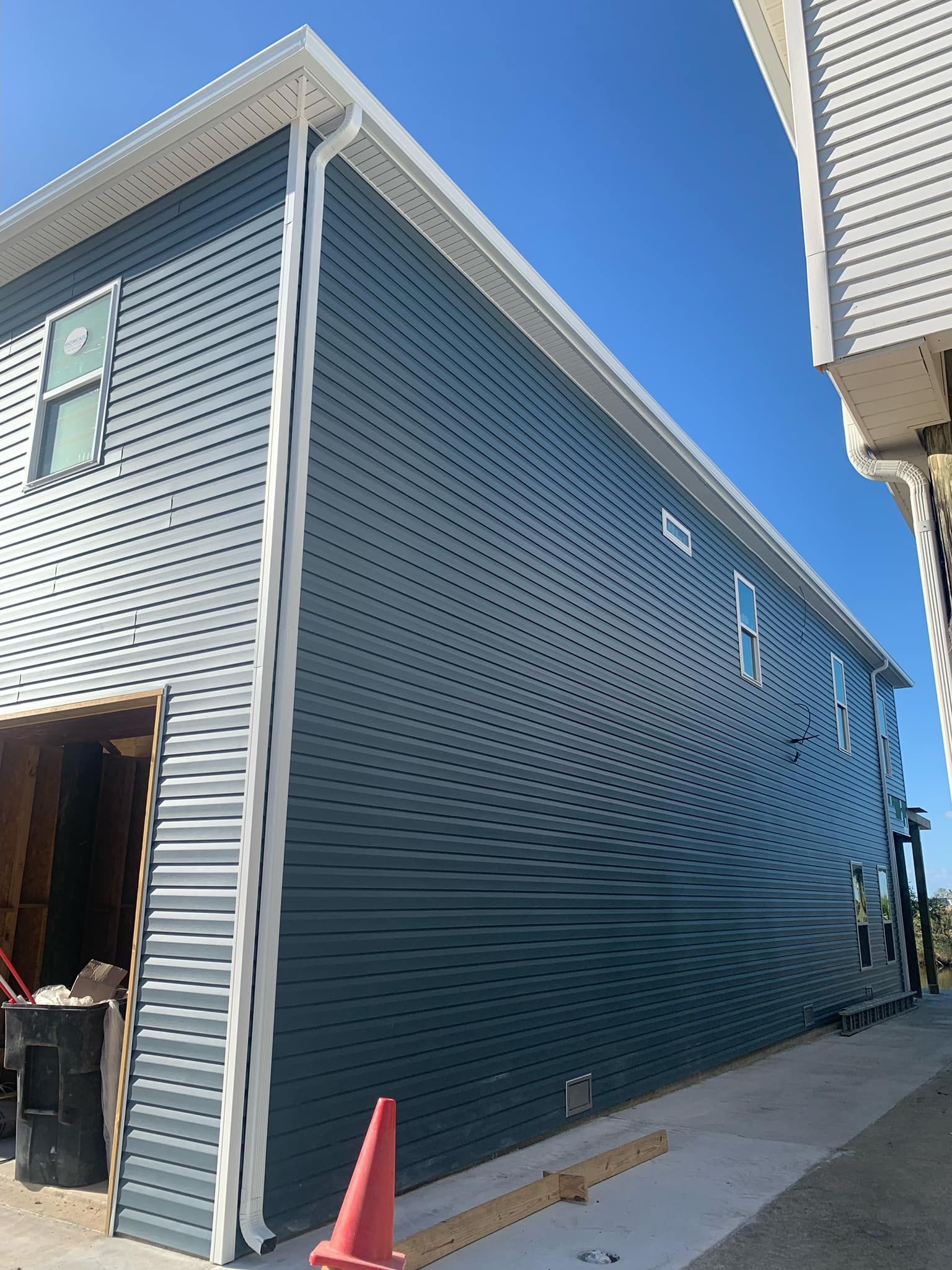 A large building with a lot of windows is being built.