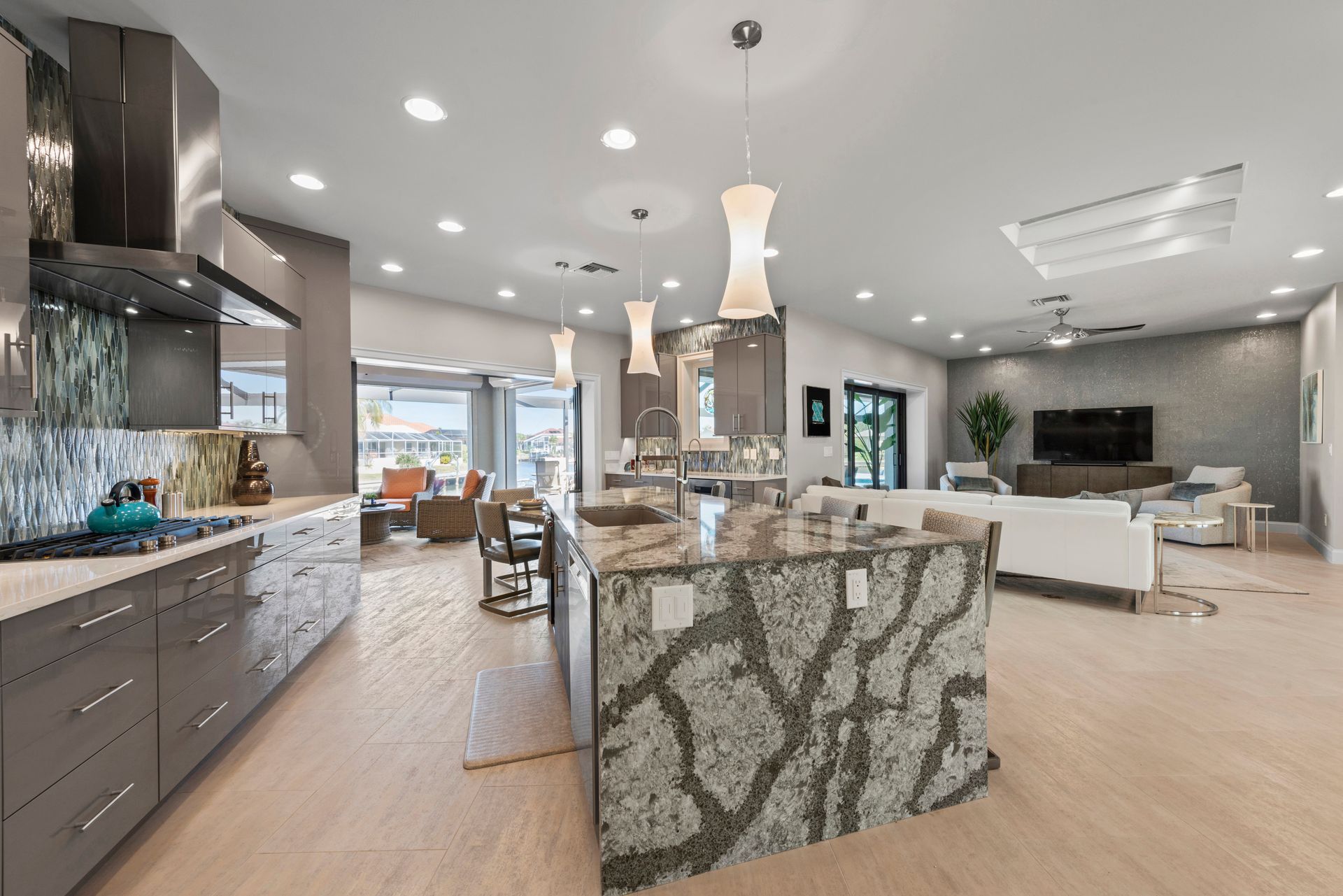 There is a large island in the middle of the kitchen.