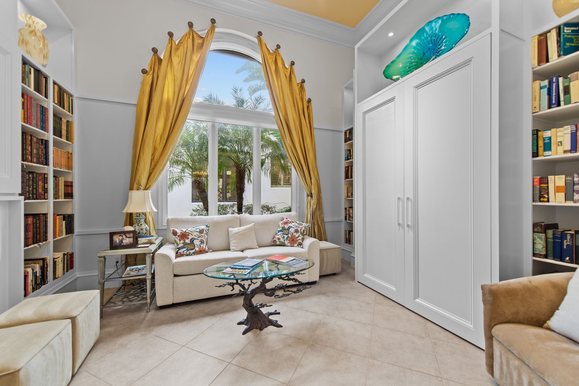 A living room with a couch and a table