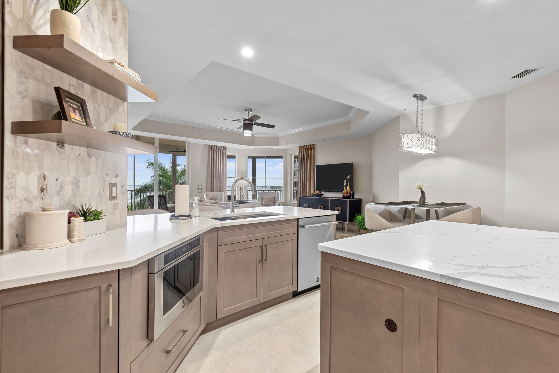 A kitchen with a large island in the middle of the room.