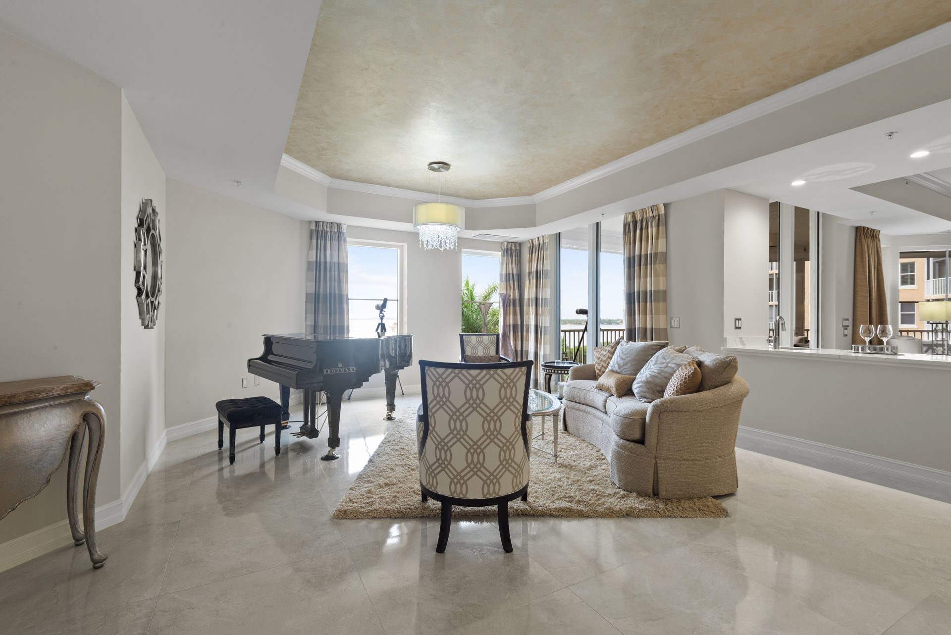 A living room with a piano and a couch