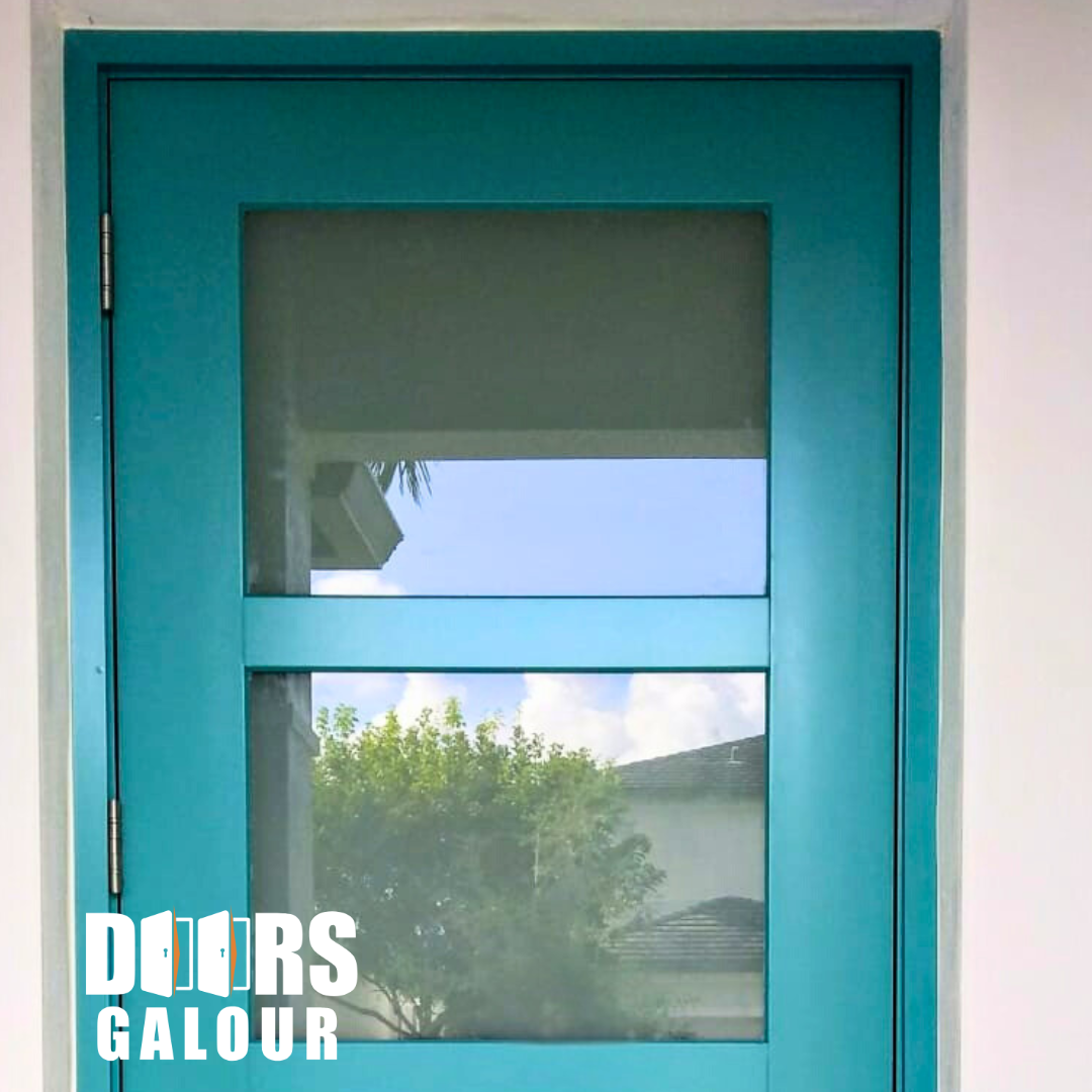 Teal front door with rectangular glass panes. A tree and sky visible through the glass. 