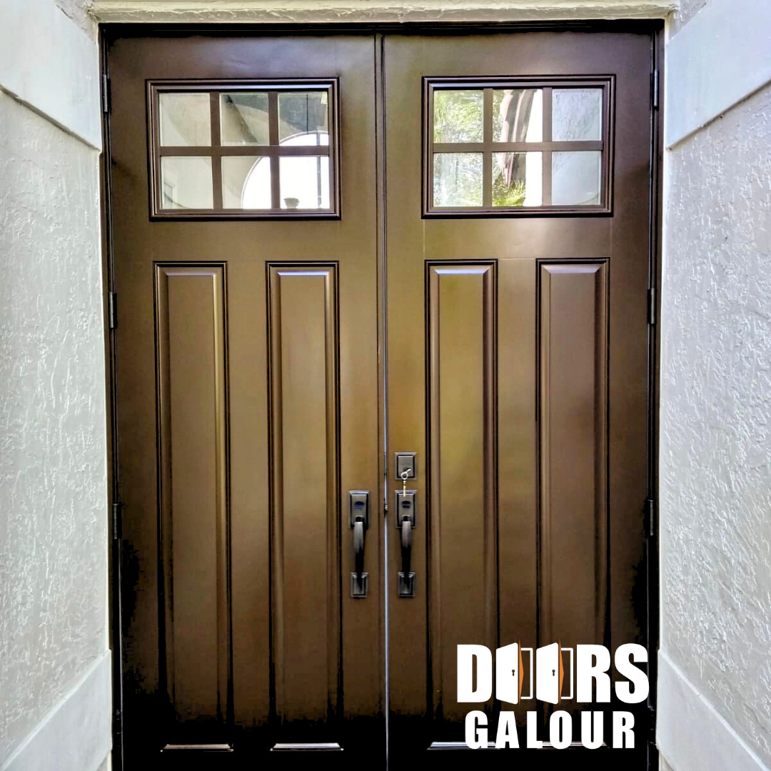 Double brown front doors with upper glass panels, in a stucco entryway.