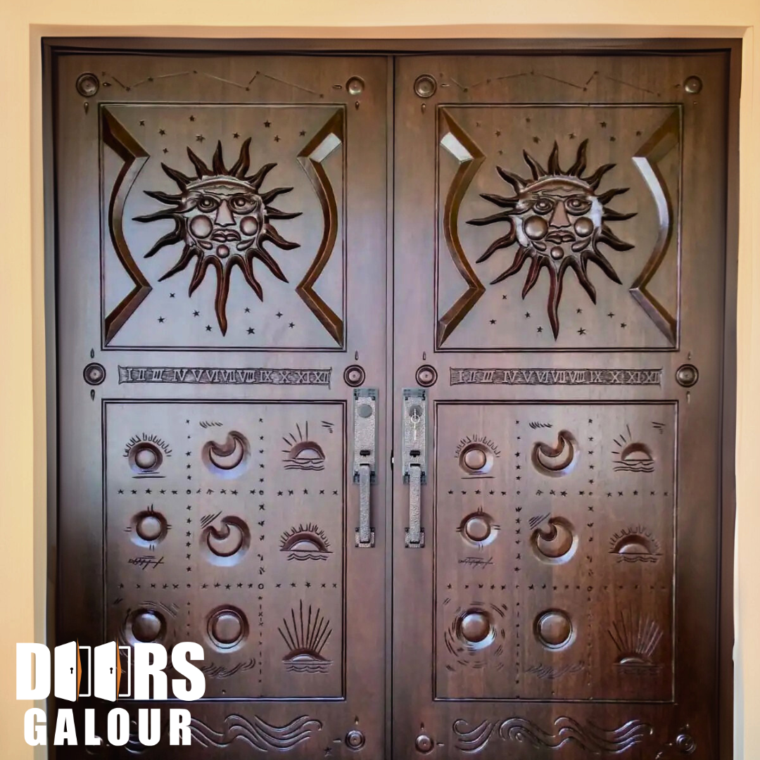 Bronze double doors with sun face carvings and geometric patterns.