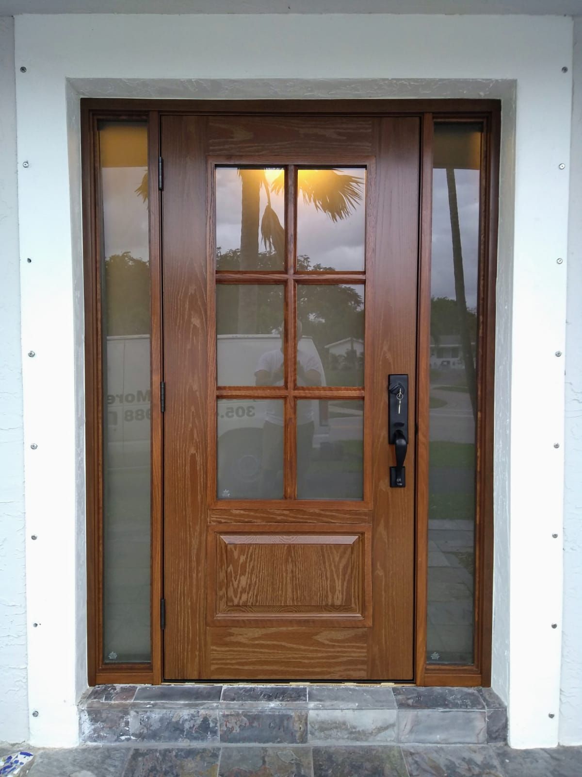 A double impact door with custom-made glass in South Florida