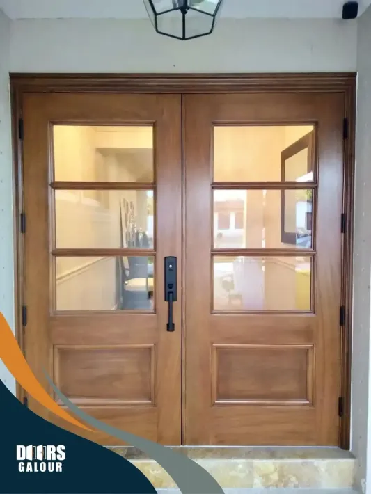 A picture of a wooden double door with glass
