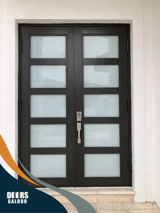 A black impact door with frosted glass.