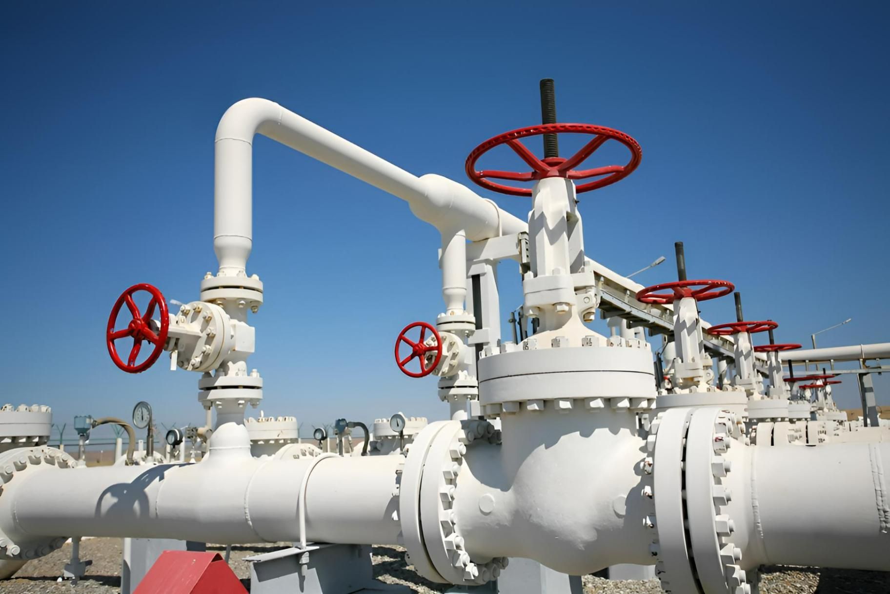 A Bunch Of White Pipes With Red Valves On Them — Illawarra Fasteners Pty Ltd In Unanderra, NSW
