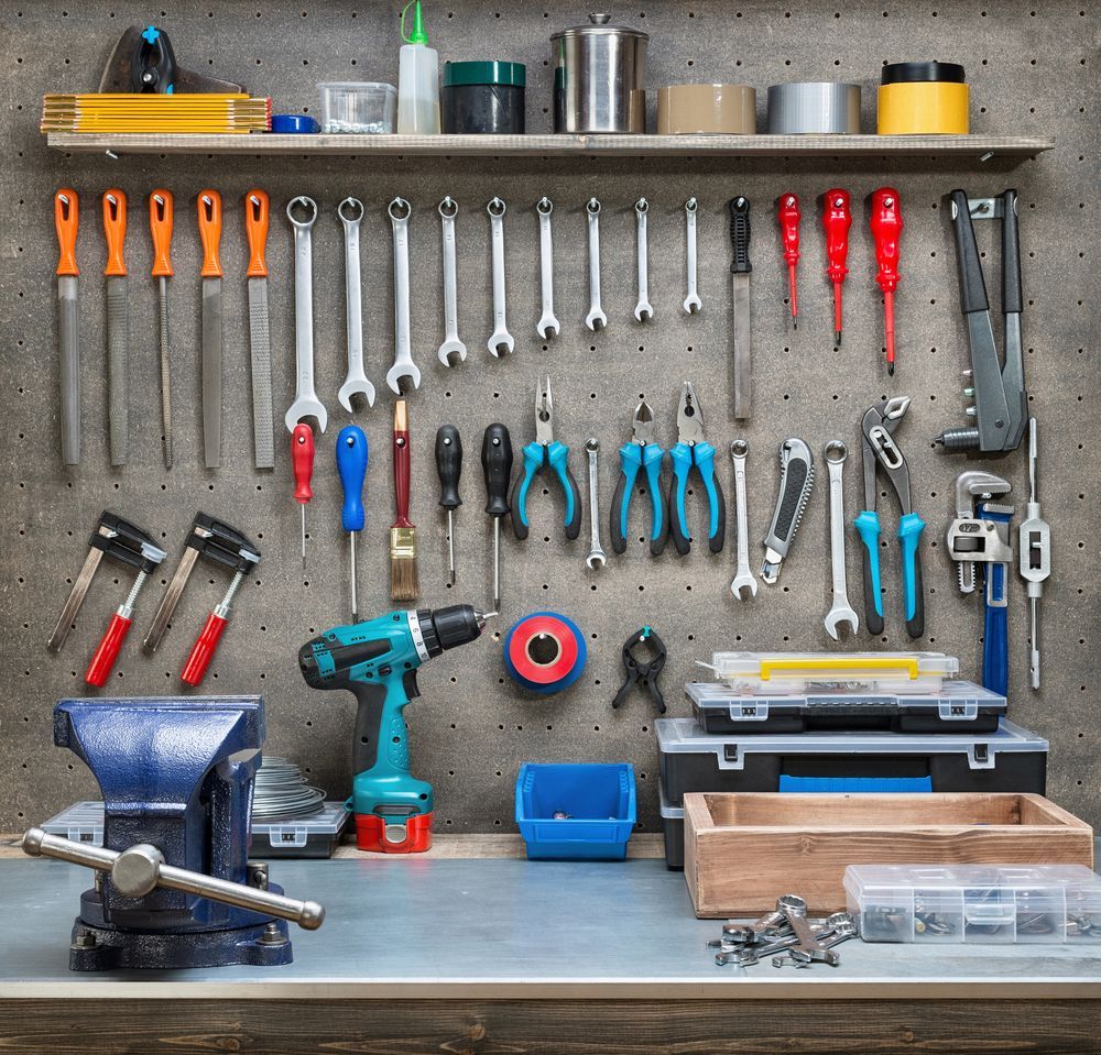 A Workbench With Lots Of Tools Hanging On The Wall — Illawarra Fasteners Pty Ltd In Unanderra, NSW
