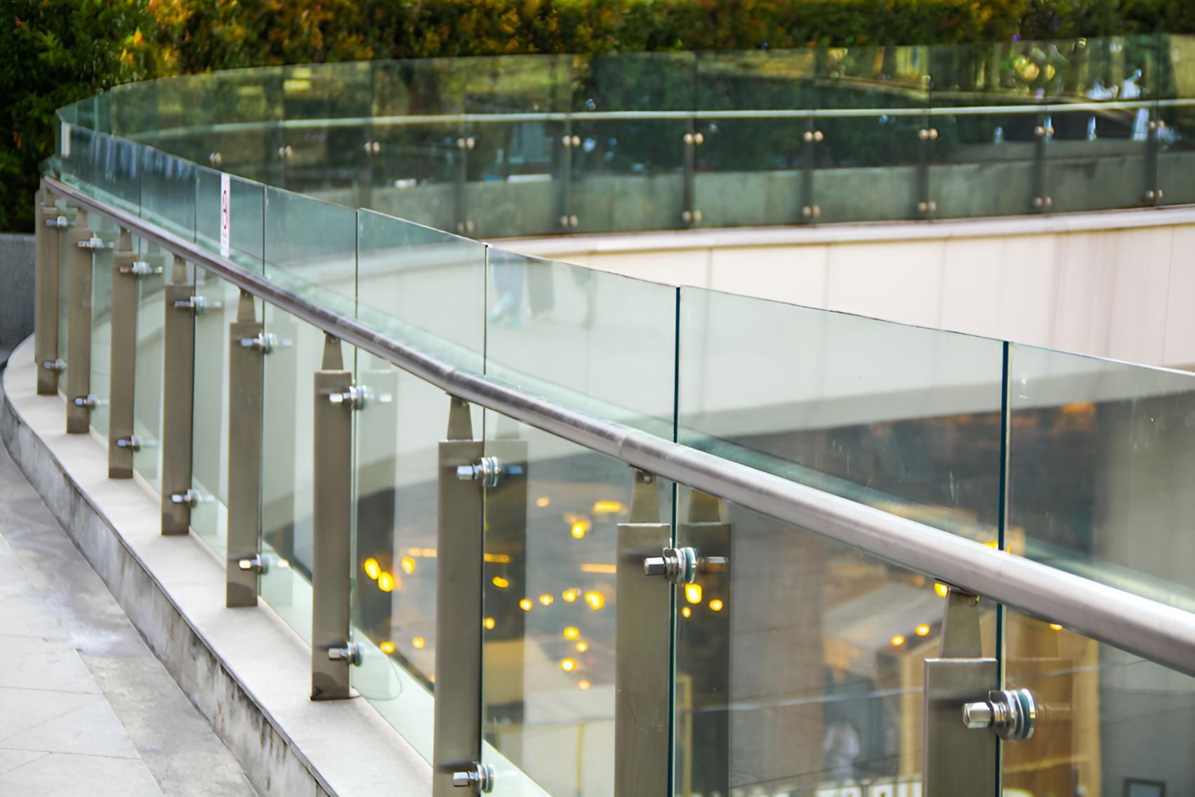A Glass Railing With Stainless Steel Posts — Illawarra Fasteners Pty Ltd In Unanderra, NSW