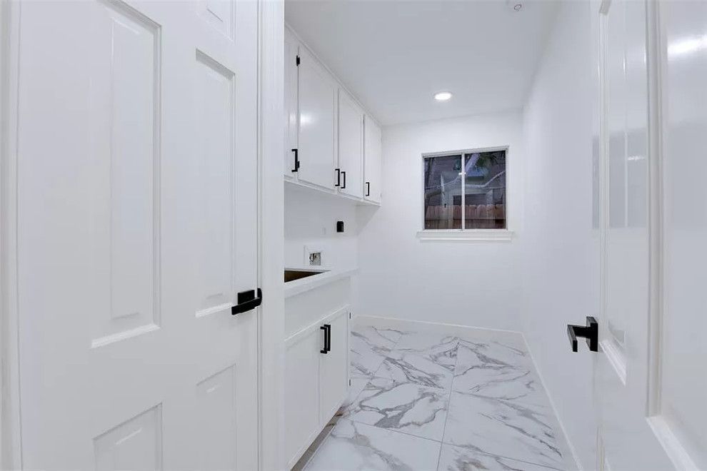 Laundry room remodeling and cabinet installation by SPS Remodeling in Conroe Texas