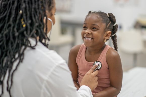 High Five With Kid — Atlanta, GA — Pedia-Doc Children’s Medical Center