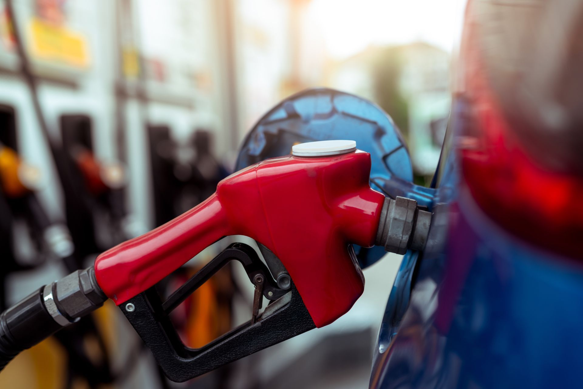 A car is being filled with gas at a gas station.