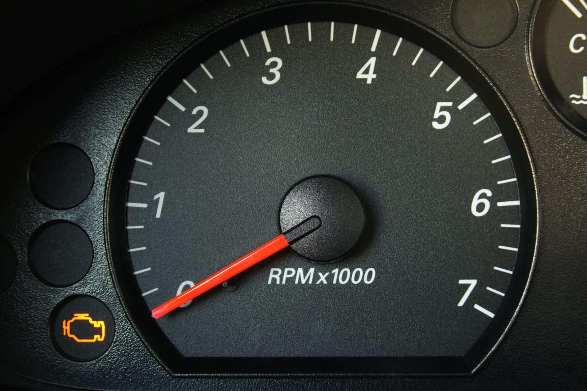 A close up of a tachometer that says rpm x 1000