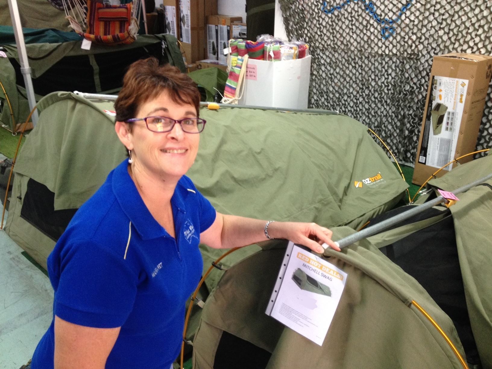Holding a tent — Camping Store in Mackay, QLD