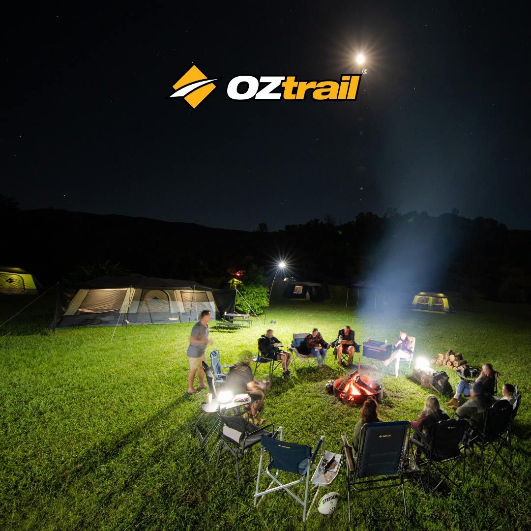 A Group of People Camping at Night — Camping Store in Mackay, QLD