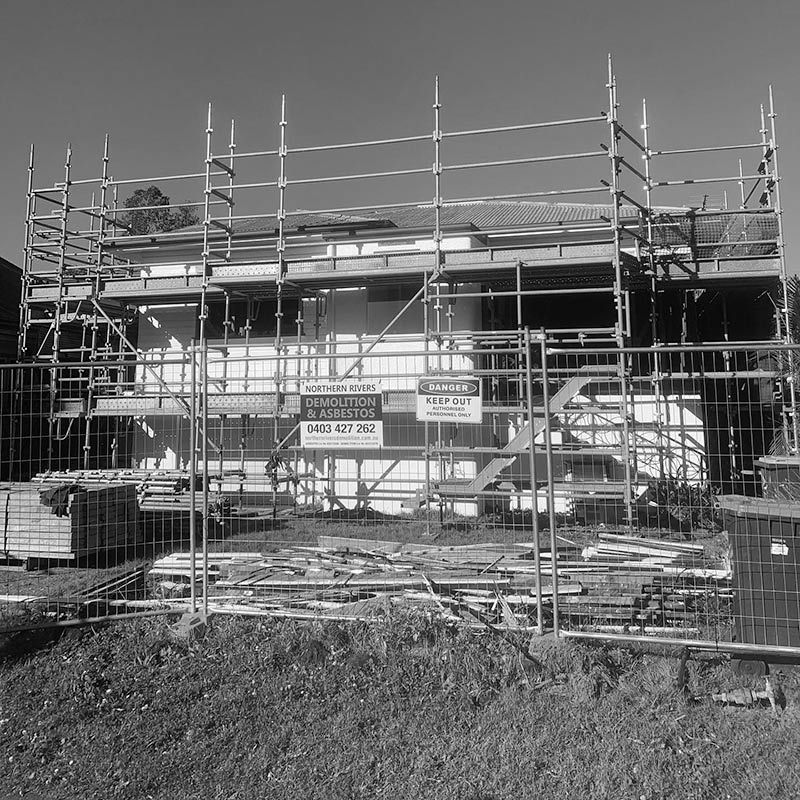 A Black and White Photo of a Building Under Construction — RM Scaffolding Solutions in Murwillumbah, NSW