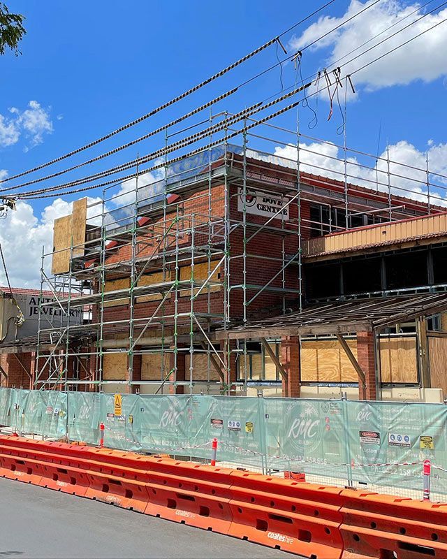 A Building Under Construction With Scaffolding on the Side of It — RM Scaffolding Solutions in Lennox Head, NSW