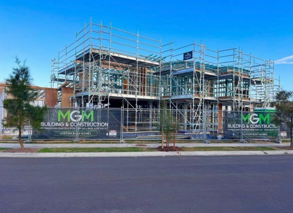 A Large Building Under Construction With Scaffolding Around It — RM Scaffolding Solutions in Lennox Head, NSW