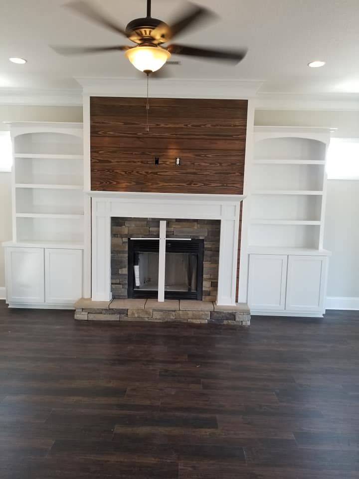 Fireplace and A Ceiling Fan