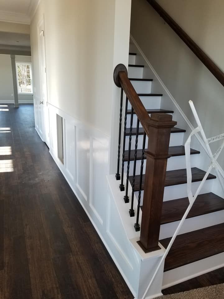 Stairs and A Wooden Railing 
