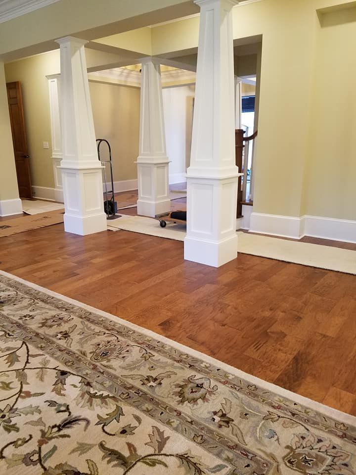 Hardwood Floors and White Columns
